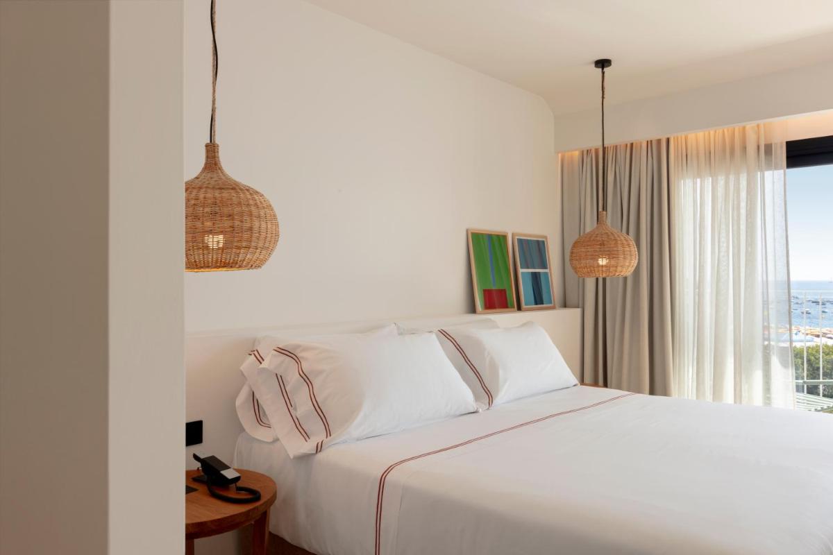 Cama o camas de una habitación en Elisabeth by the Sea Hotel
