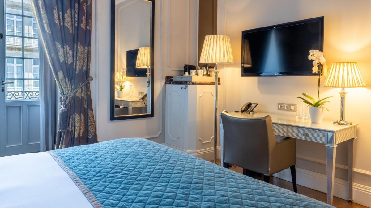 Uma cama ou camas num quarto em InterContinental Porto - Palacio das Cardosas by IHG
