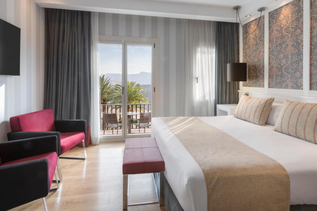 Cama o camas de una habitación en Catalonia Reina Victoria