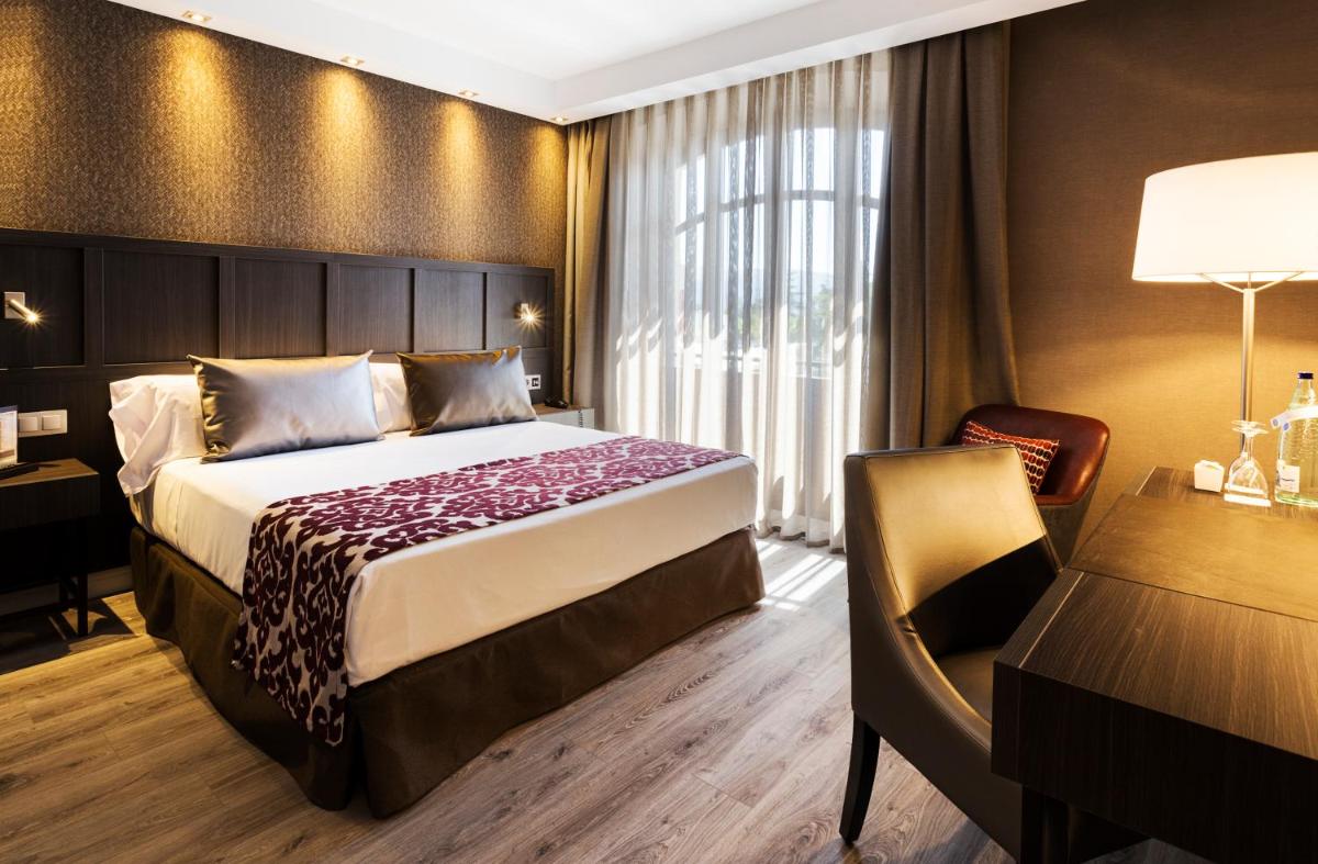 Cama o camas de una habitación en Catalonia Ronda