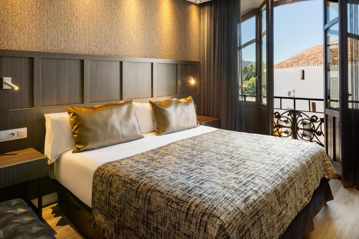 Cama o camas de una habitación en Catalonia Ronda