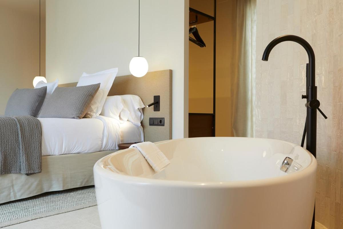 Cama o camas de una habitación en 1881 Hotel Balneario Vichy Catalan
