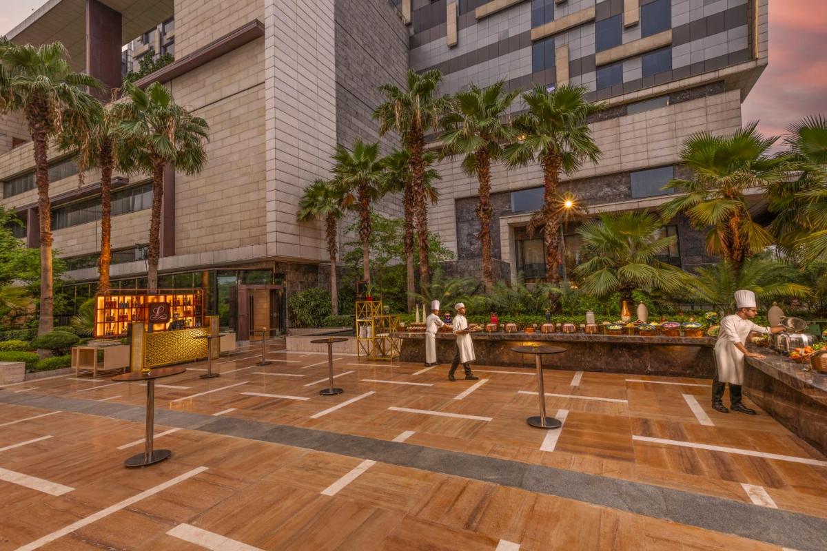 a rendering of a courtyard in a building at The Leela Ambience Convention Hotel Delhi in New Delhi