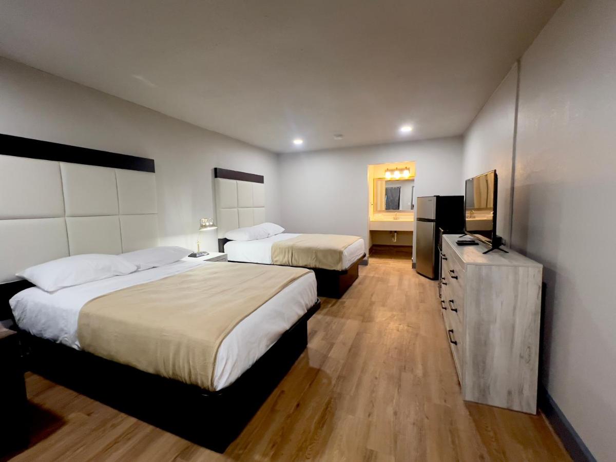 ECONOMY INN AND SUITES - Housity