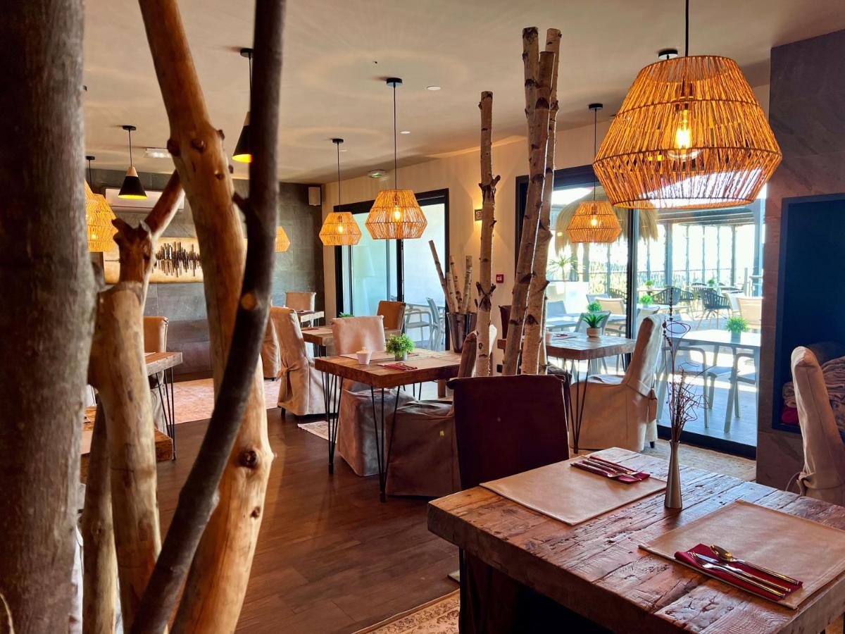 Restaurant ou autre lieu de restauration dans l'établissement Domaine de Chalvêches Hôtel SPA 4*