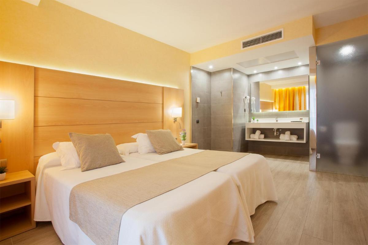 Cama o camas de una habitación en Hotel Pimar & Spa