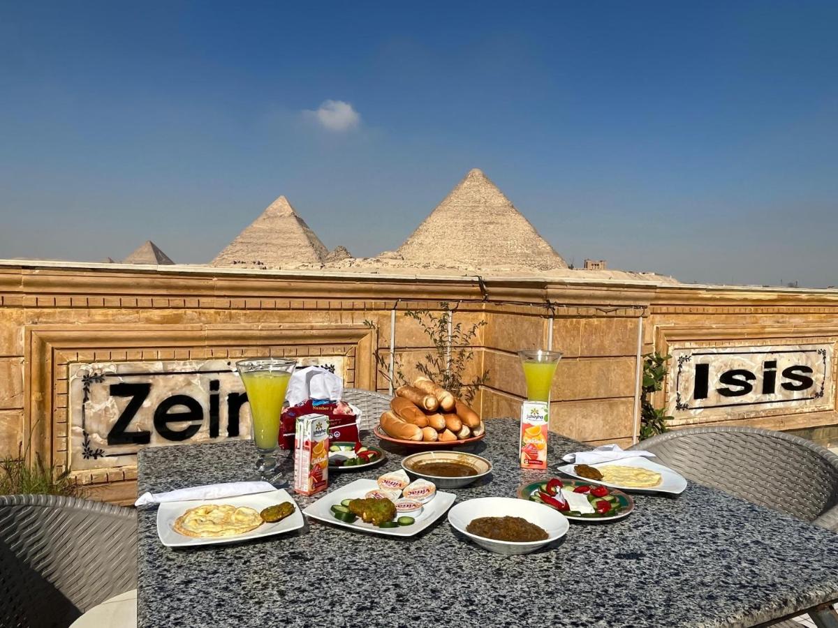 Queen Isis pyramids view - Housity