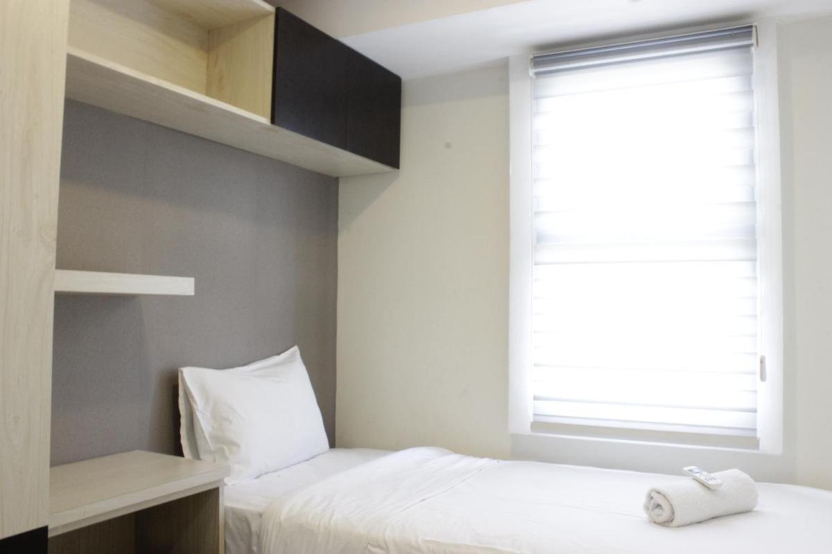 Homey 2BR Apartment at Parahyangan Residence near Parahyangan University By Travelio - Housity