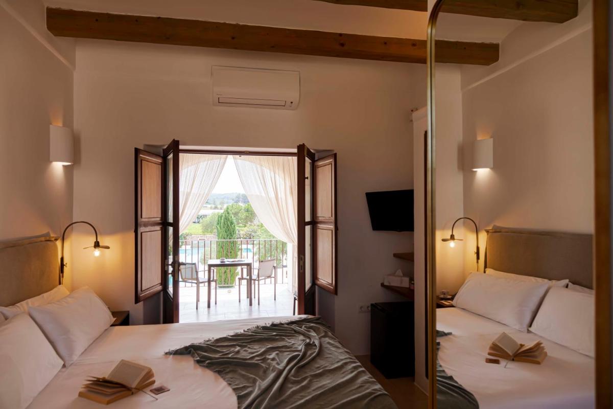 Cama o camas de una habitación en Ca Na Xica - Hotel & Spa