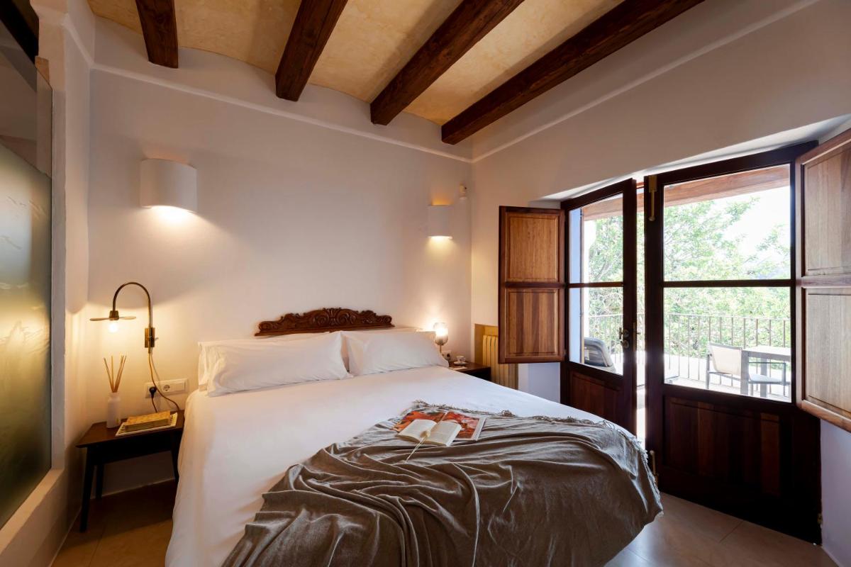 Cama o camas de una habitación en Ca Na Xica - Hotel & Spa