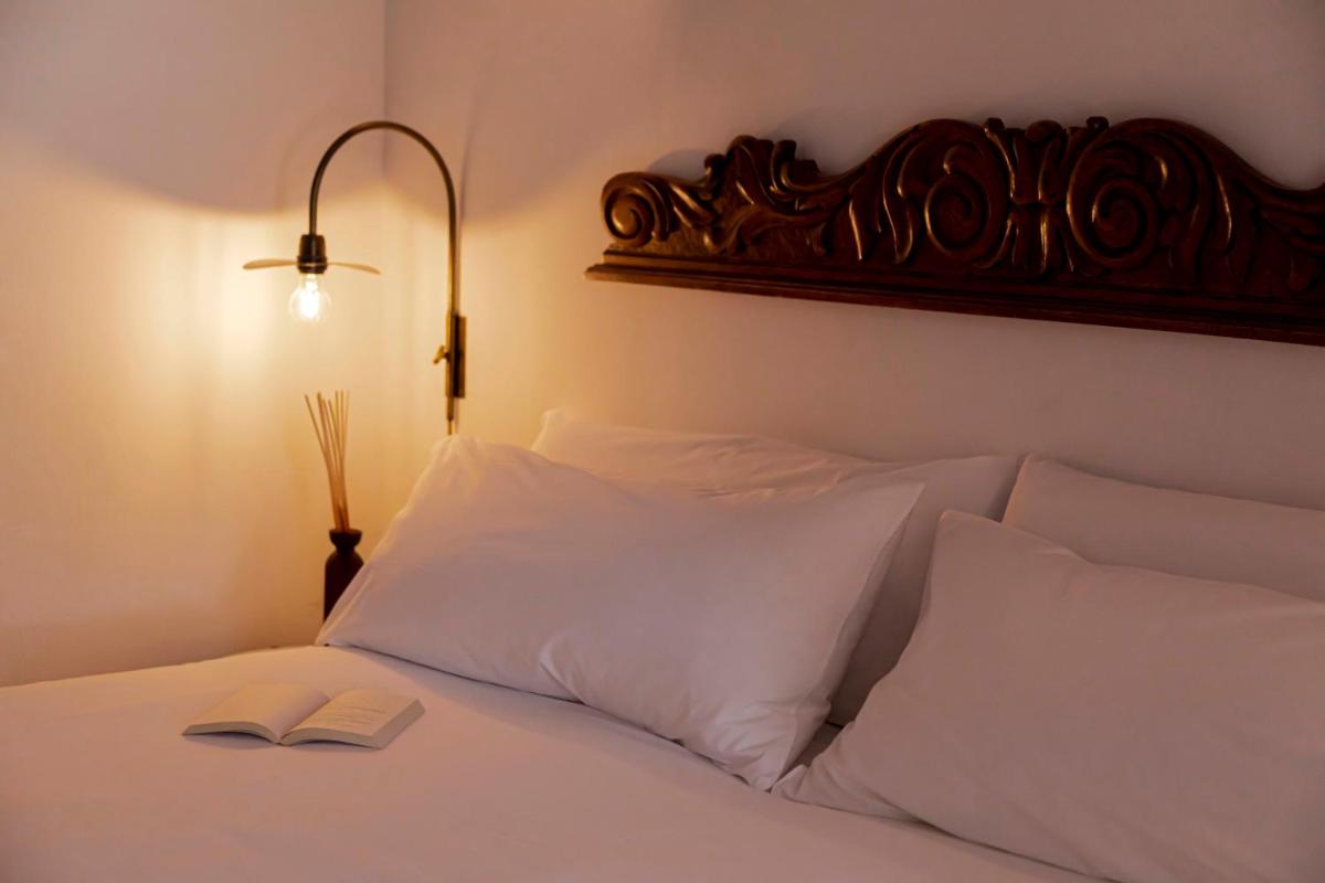 Cama o camas de una habitación en Ca Na Xica - Hotel & Spa