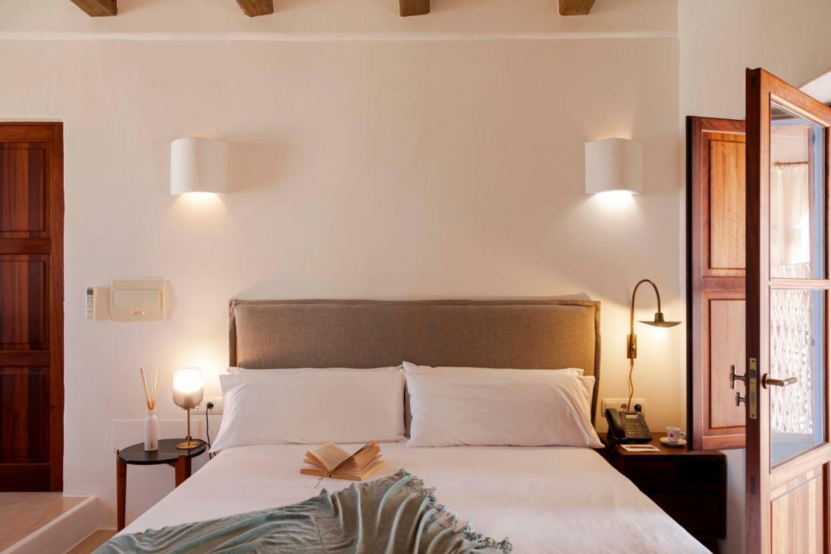 Cama o camas de una habitación en Ca Na Xica - Hotel & Spa