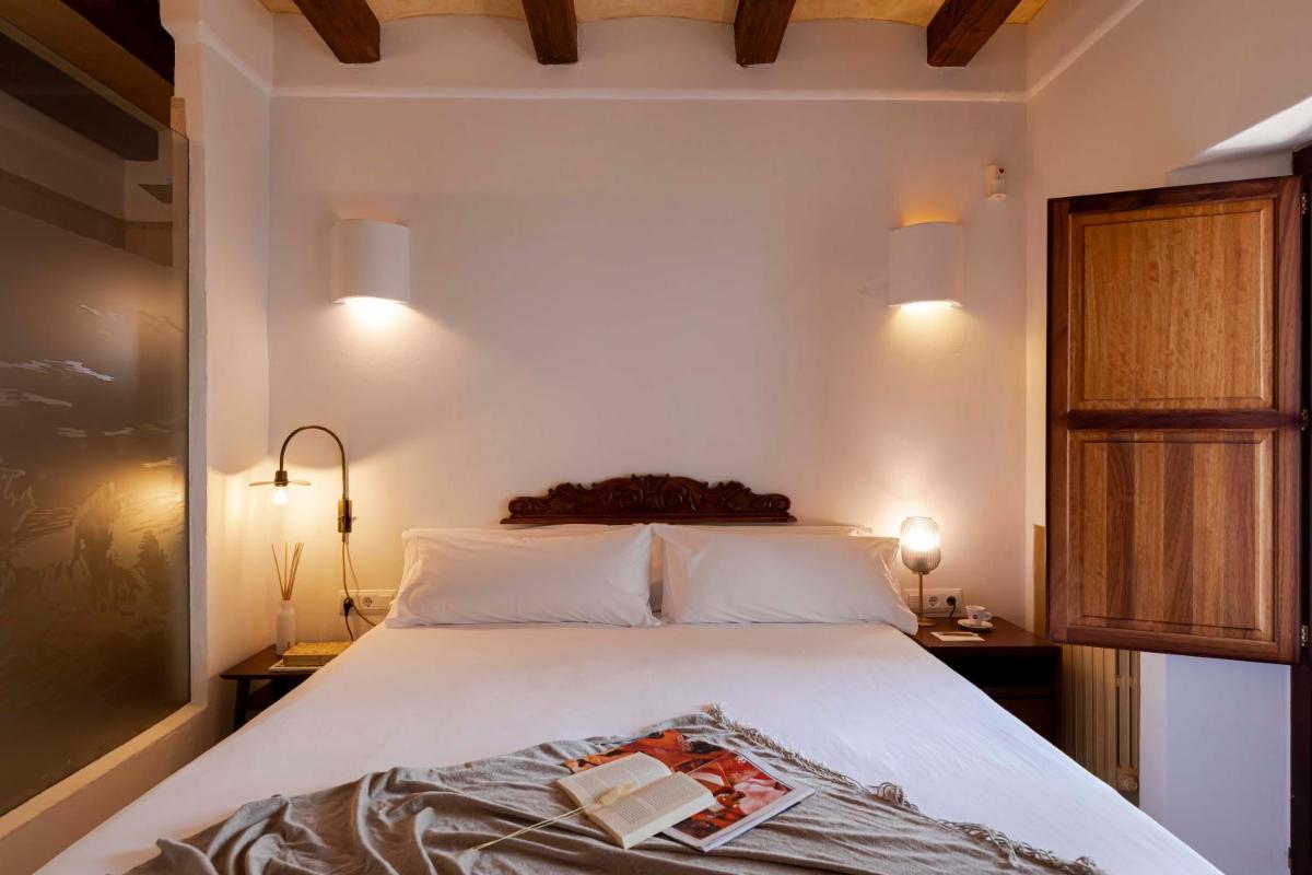 Cama o camas de una habitación en Ca Na Xica - Hotel & Spa