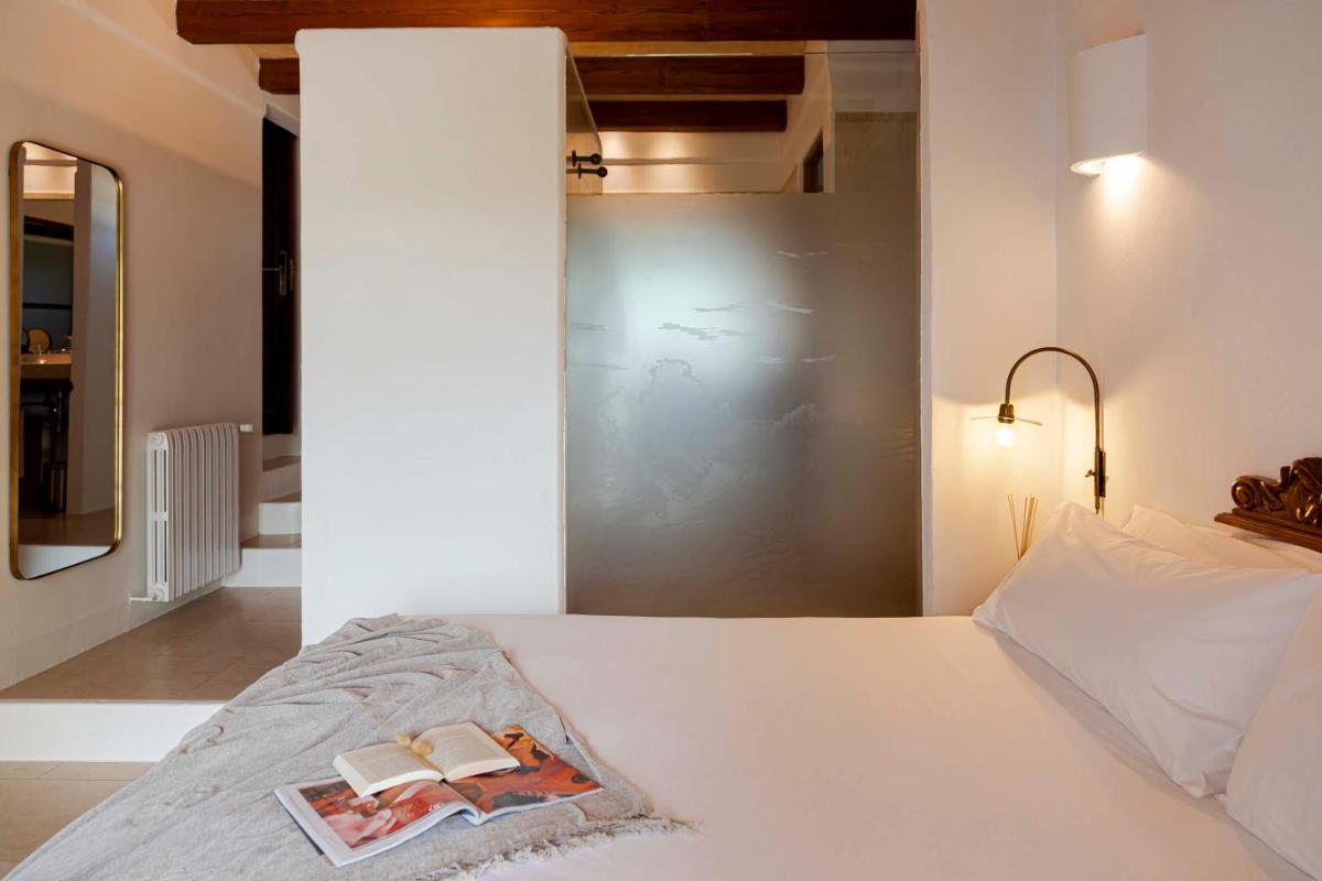 Cama o camas de una habitación en Ca Na Xica - Hotel & Spa