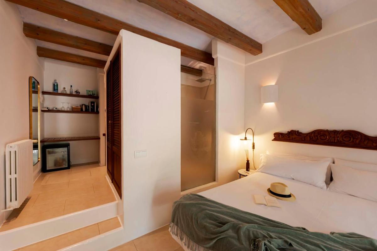 Cama o camas de una habitación en Ca Na Xica - Hotel & Spa