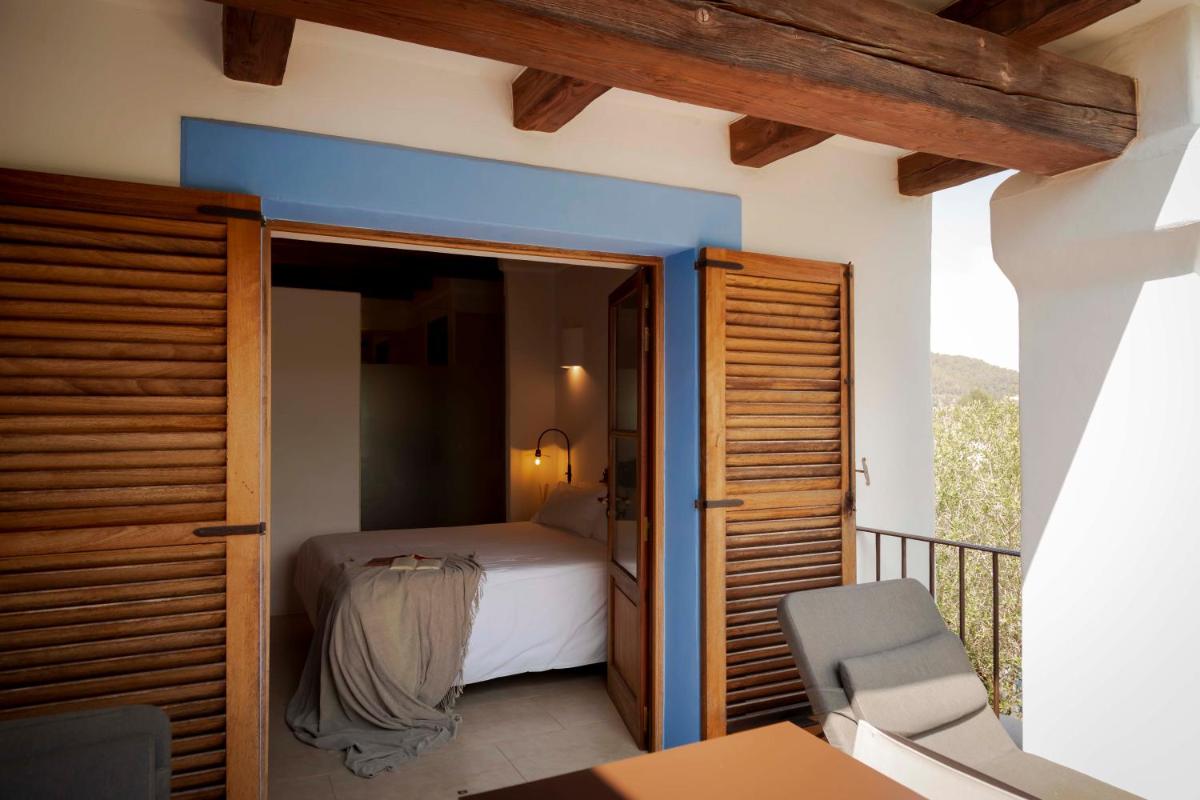 Cama o camas de una habitación en Ca Na Xica - Hotel & Spa