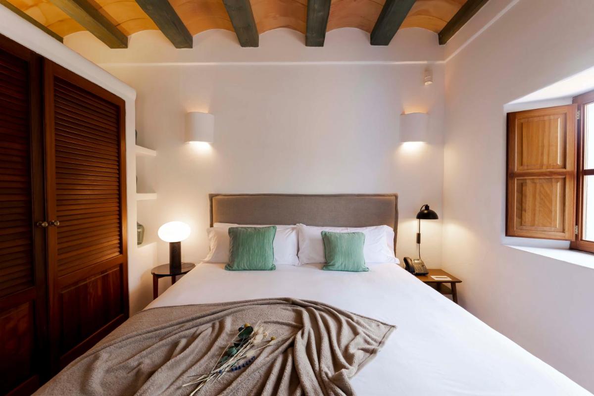 Cama o camas de una habitación en Ca Na Xica - Hotel & Spa