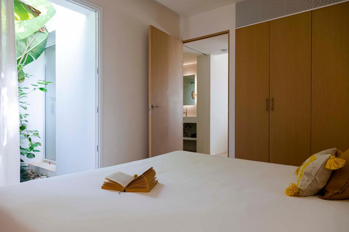 Cama o camas de una habitación en Ca Na Xica - Hotel & Spa