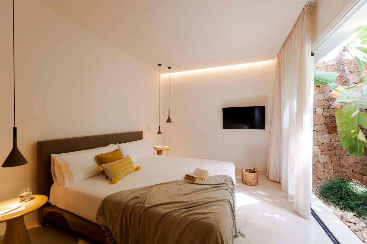 Cama o camas de una habitación en Ca Na Xica - Hotel & Spa