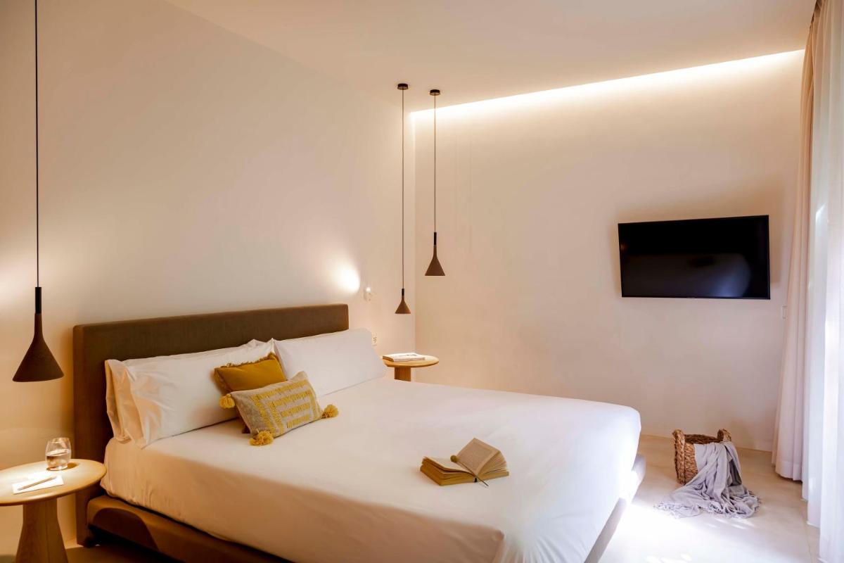 Cama o camas de una habitación en Ca Na Xica - Hotel & Spa