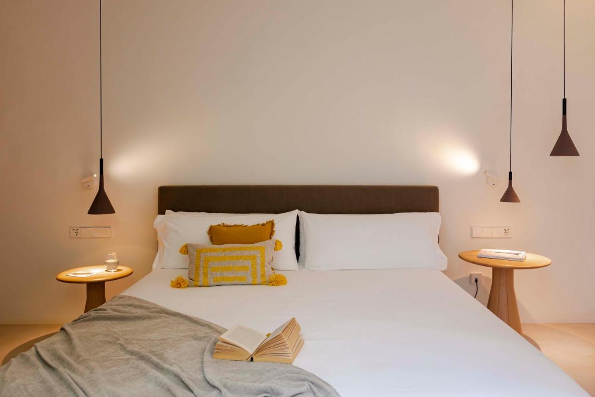 Cama o camas de una habitación en Ca Na Xica - Hotel & Spa