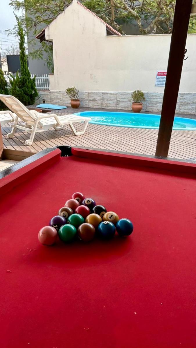 CASA DE PRAIA TOP , BETO CARRERO , 3QT, 2WC, Piscina e Sinuca, Ar Condicionado, 3 vagas, 300m da Praia , 500m do Parque - Housity