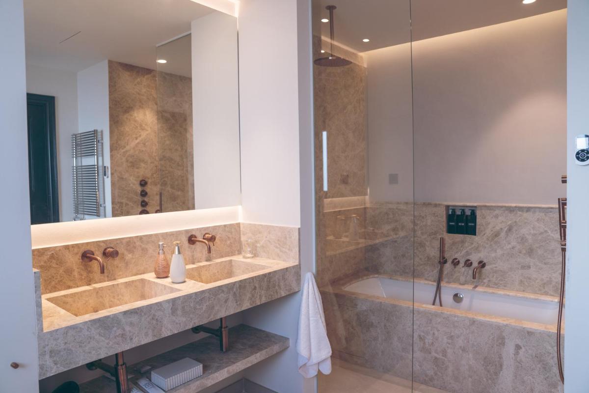 Un baño de Hotel Boutique Sidonia