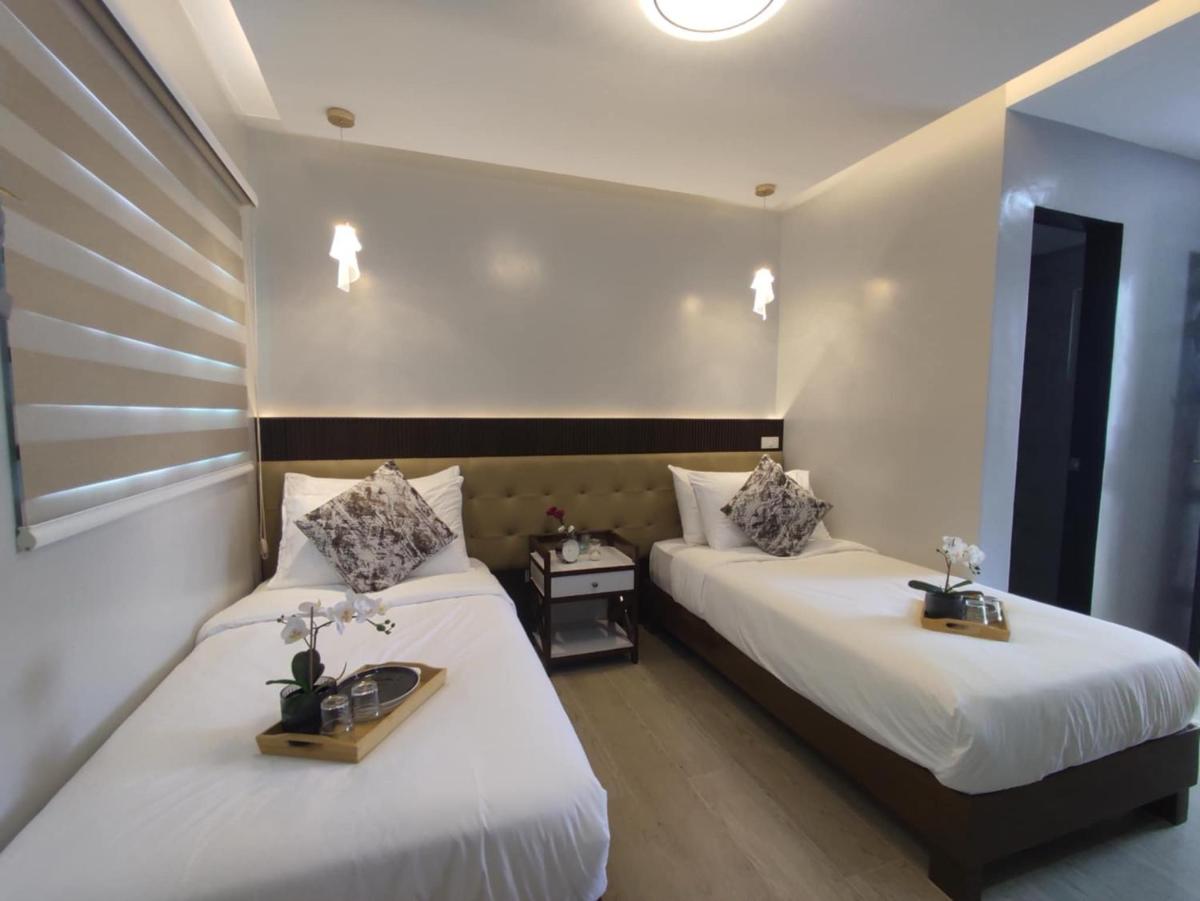 J Spazio Apartelle and Cafe - Housity