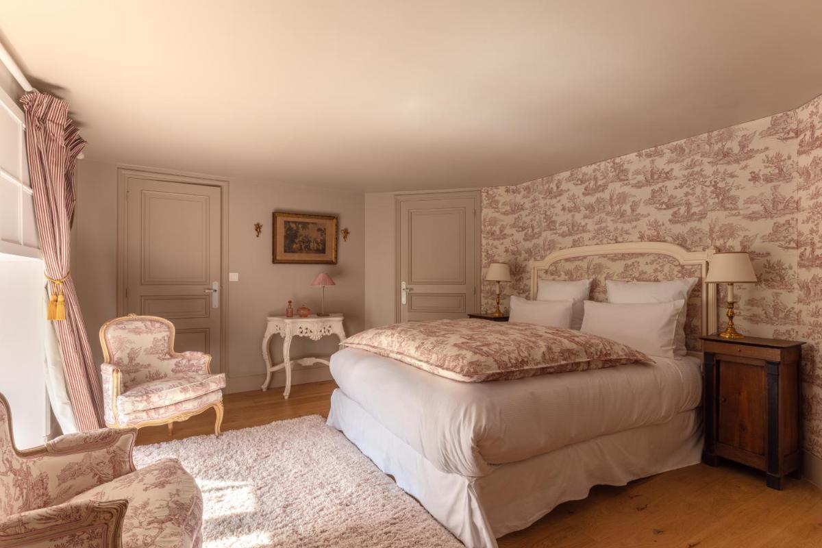 Un ou plusieurs lits dans un hébergement de l'établissement Le Château d'Etoges - Champagne