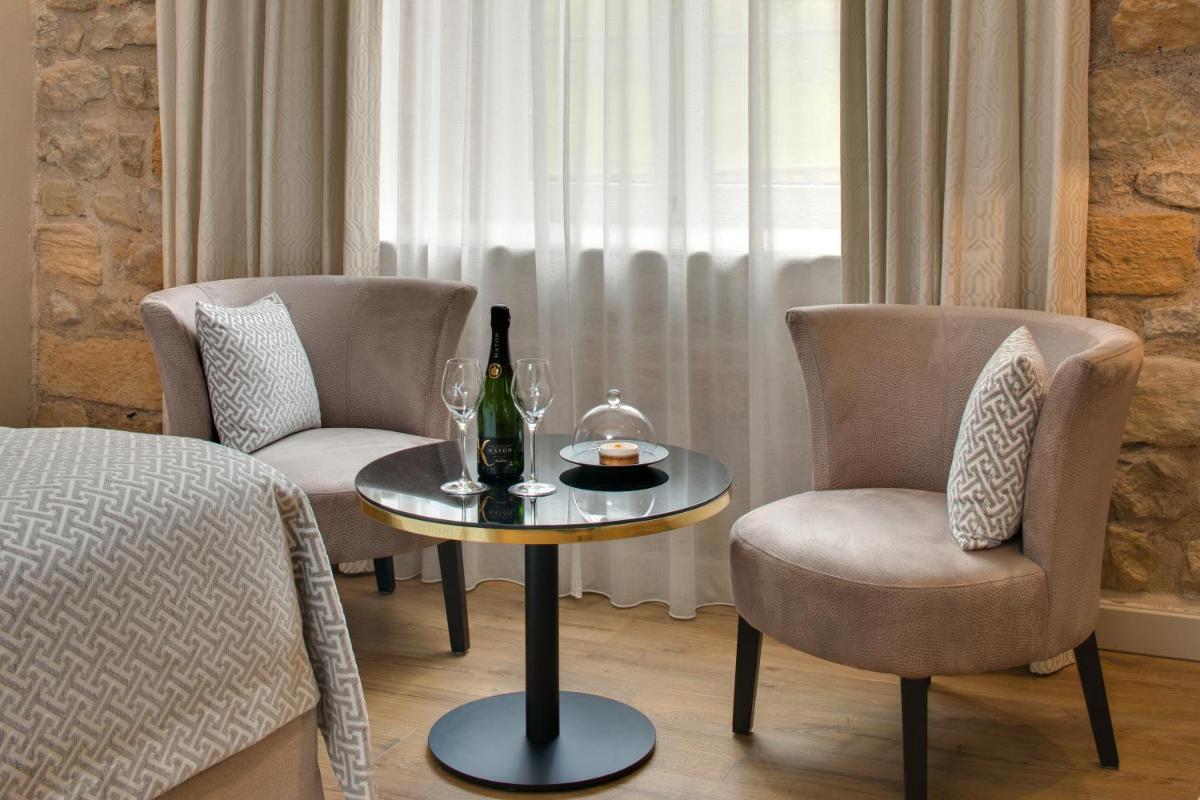 Coin salon dans l'établissement Domaine de la Klauss & Spa, Restaurant Gastronomique Le K