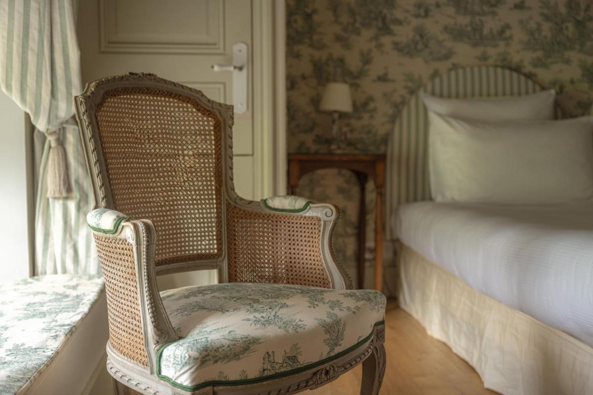 Un ou plusieurs lits dans un hébergement de l'établissement Le Château d'Etoges - Champagne