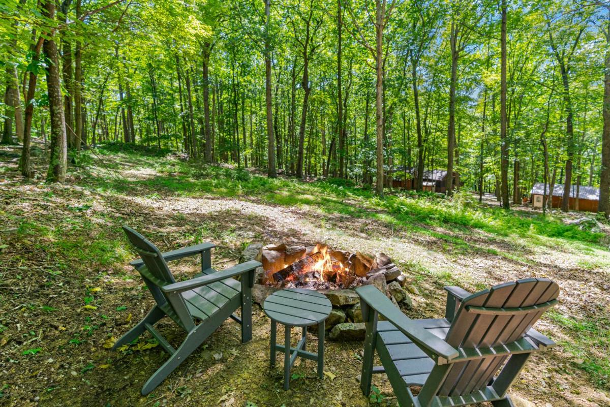 Tucked Away w Hot Tub, Fire Pit, Deck, & WiFi - Housity