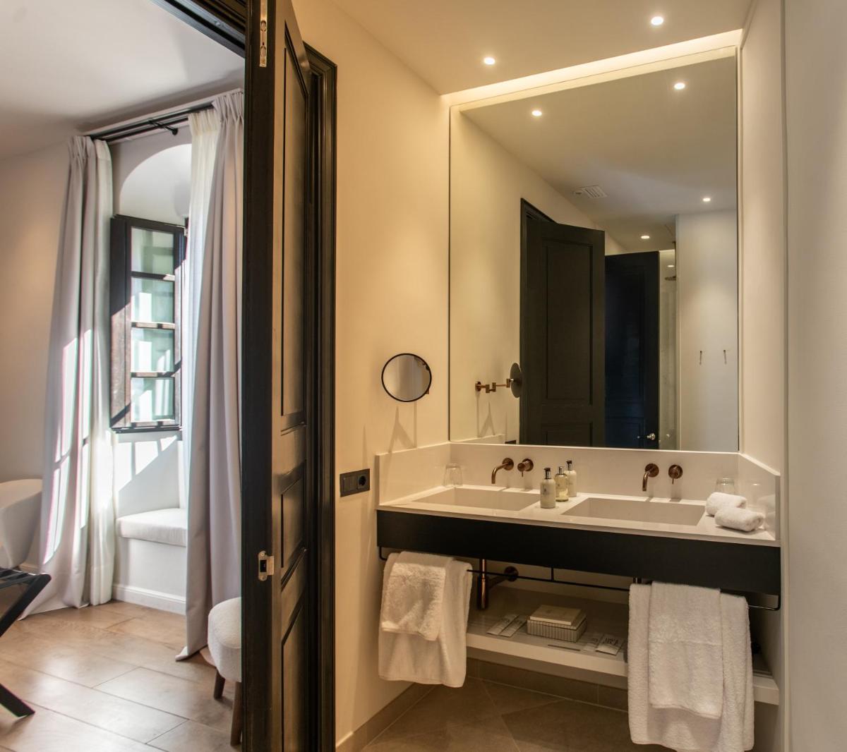 Un baño de Hotel Boutique Sidonia