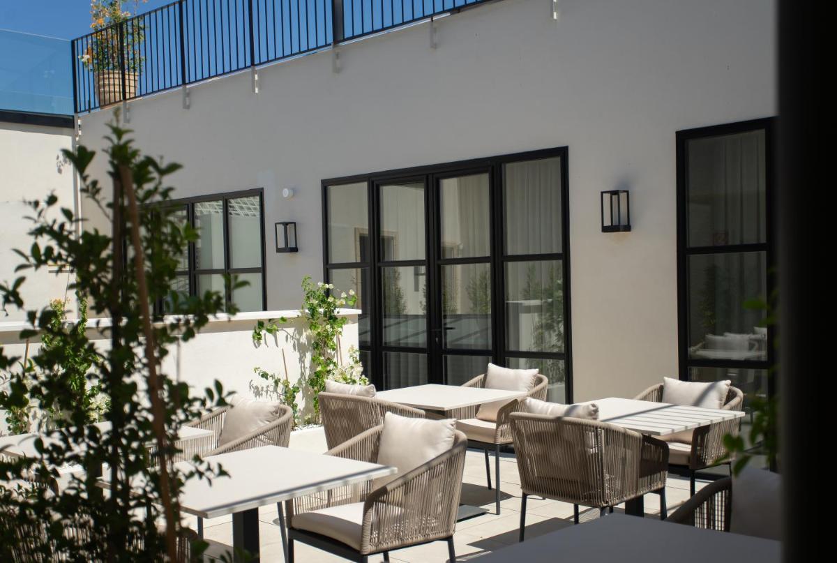 Zona de estar de Hotel Boutique Sidonia