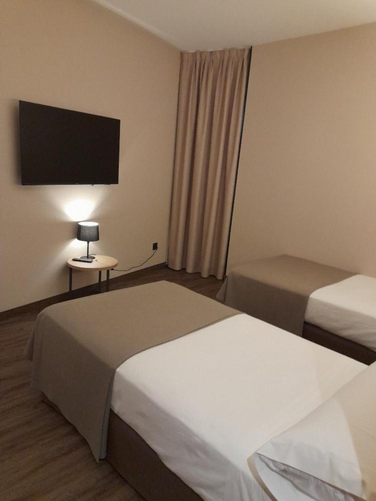 Cama o camas de una habitación en SOMMOS Hotel Benasque Spa