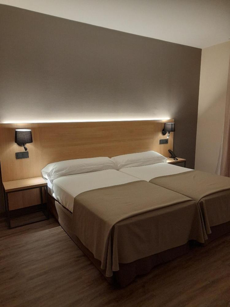 Cama o camas de una habitación en SOMMOS Hotel Benasque Spa