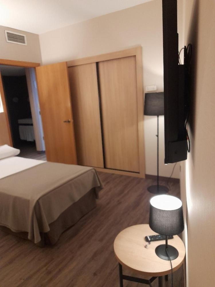 Cama o camas de una habitación en SOMMOS Hotel Benasque Spa