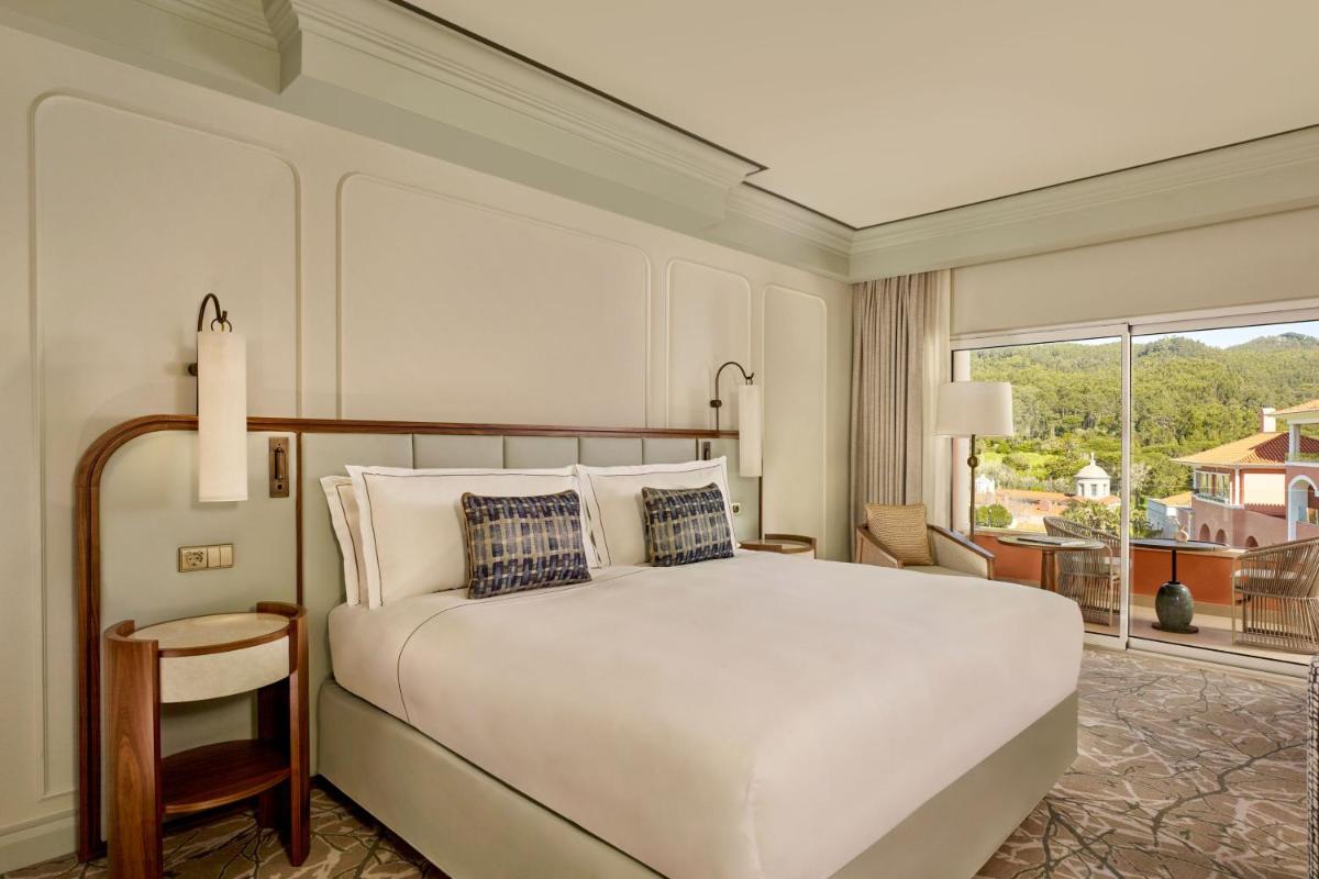Uma cama ou camas num quarto em Penha Longa Resort