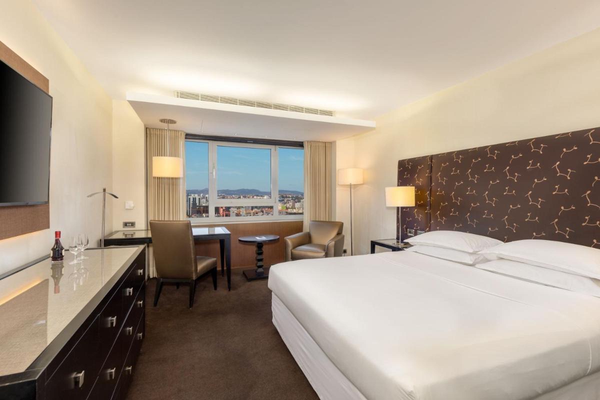 Uma cama ou camas num quarto em Sheraton Lisboa Hotel & Spa