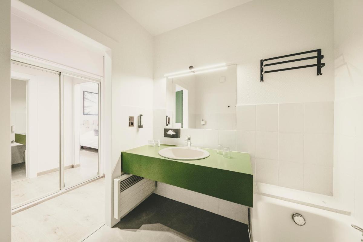 Salle de bains dans l'établissement Fleur De Neige Châtel