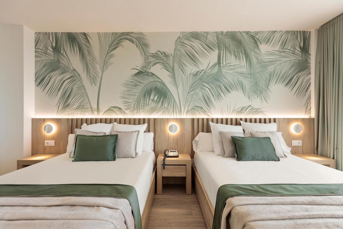 Cama o camas de una habitación en Hotel Best Triton