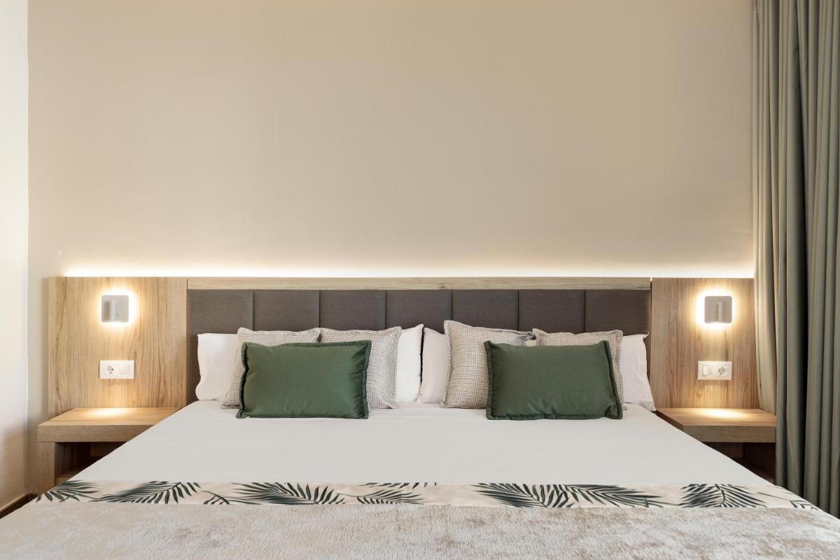 Cama o camas de una habitación en Hotel Best Triton