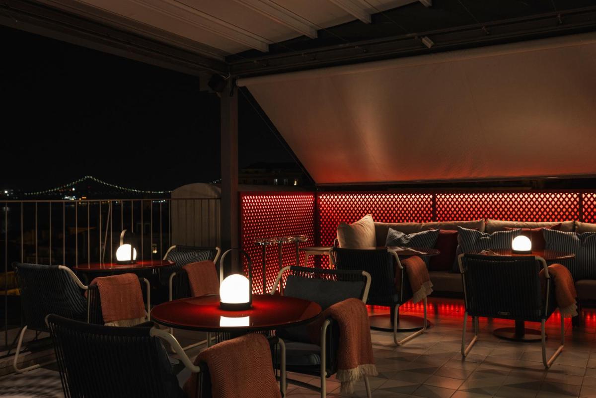 Uma área de estar em Bairro Alto Hotel
