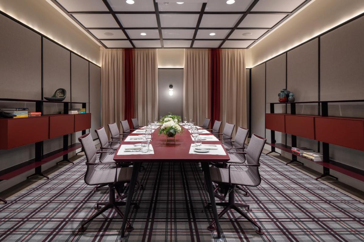 A área empresarial e/ ou a sala de conferências de Bairro Alto Hotel