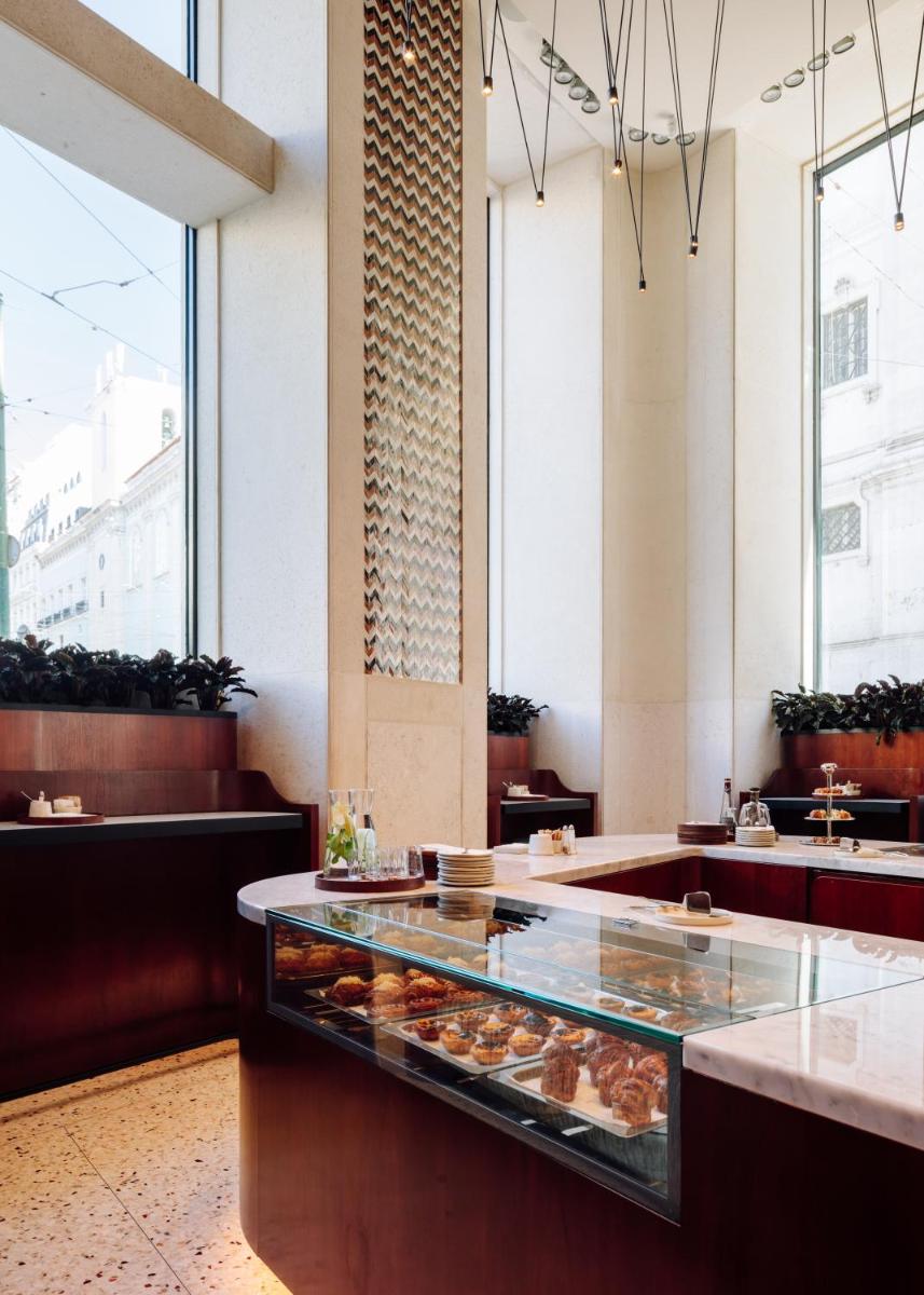 Uma área de estar em Bairro Alto Hotel