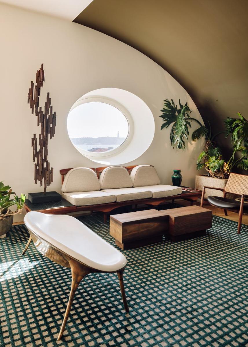 Uma área de estar em Bairro Alto Hotel