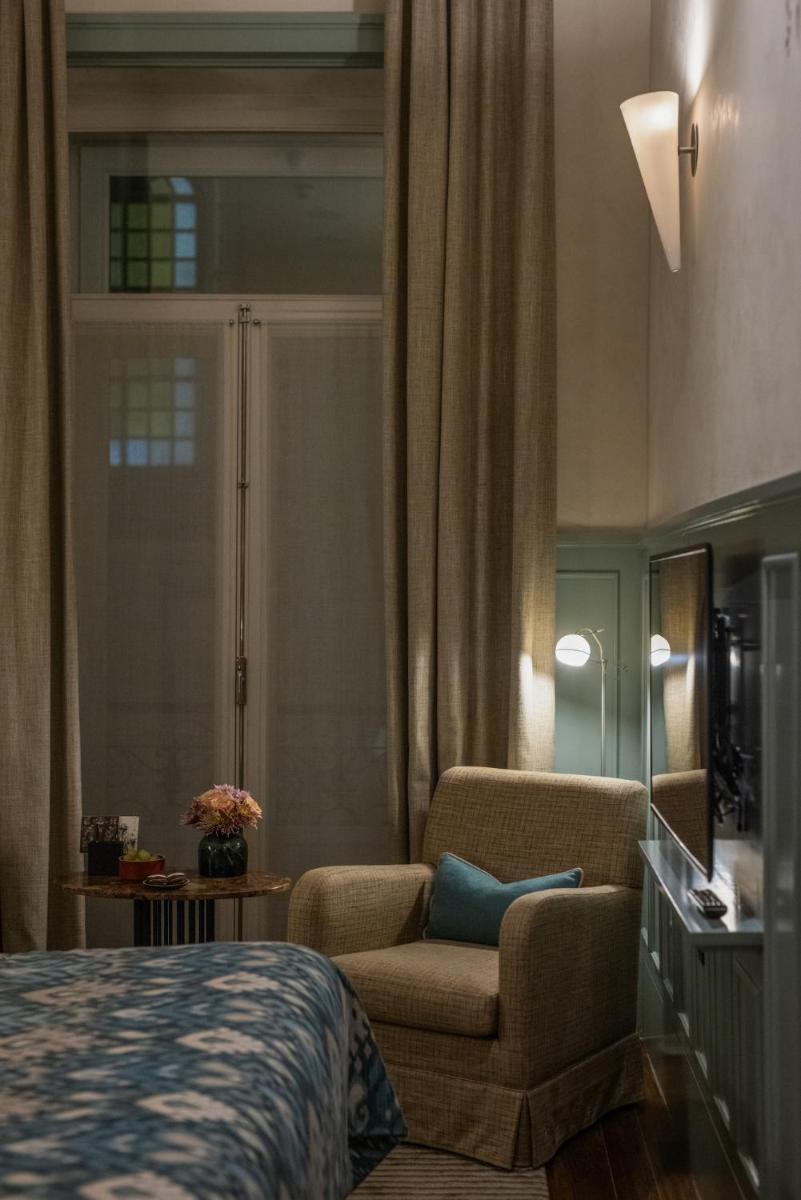 Uma área de estar em Bairro Alto Hotel