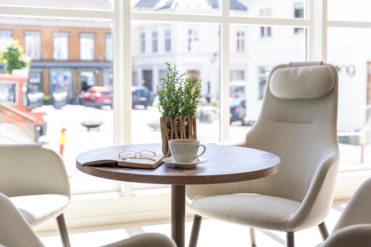 Home Hotel Grimstad - Housity