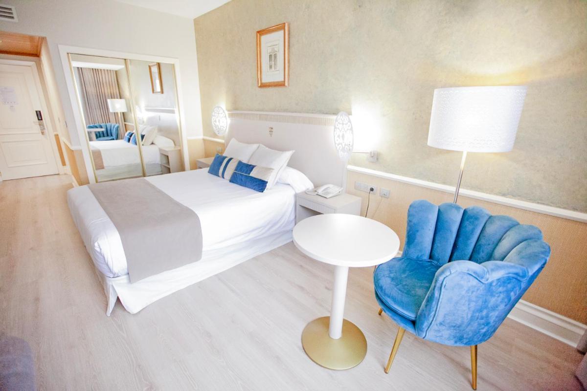 Cama o camas de una habitación en Hotel Alfonso VIII