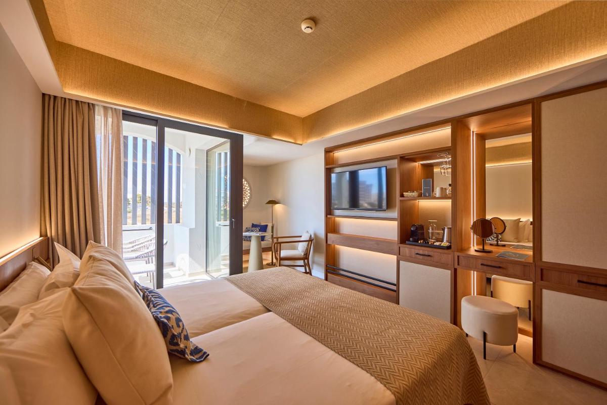 Cama o camas de una habitación en Universal Grand León & Spa
